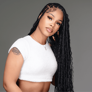 Human hair boho braids styled in long, elegant knots, showcasing a fashionable look for versatile hairstyles.