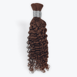 Human hair boho braids in a rich brown color with beautiful curls for stylish braiding options.