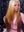 Itty X Romanjay Fall Gradient Wig modeled by influencer Itty, showcasing a stylish blend of blonde and brown hues.