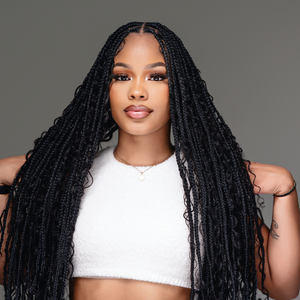 Model showcasing human hair boho braids hairstyle with long black braids, highlighting the versatile styling options.