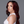 Model showcasing HD #99J Burgundy lace frontal wig with natural waves and pre-plucked hairline.