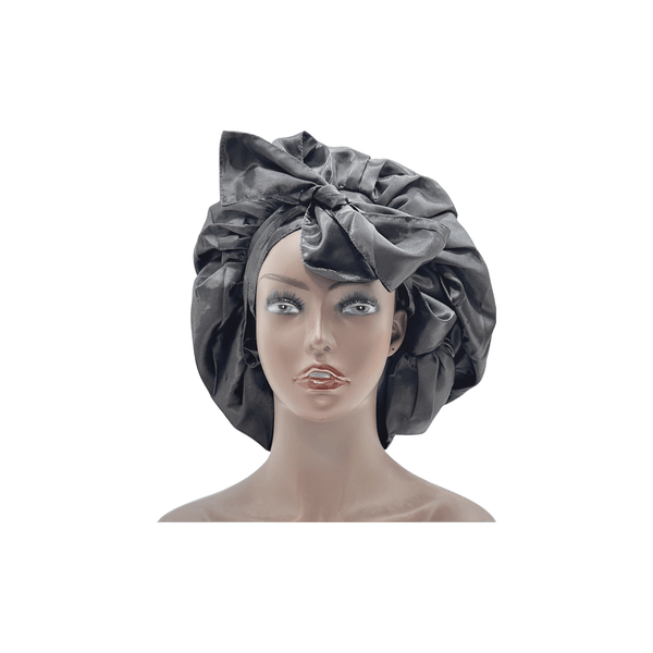 Non-slip satin bonnet with tie band, perfect for protecting hair overnight and ensuring no mess.