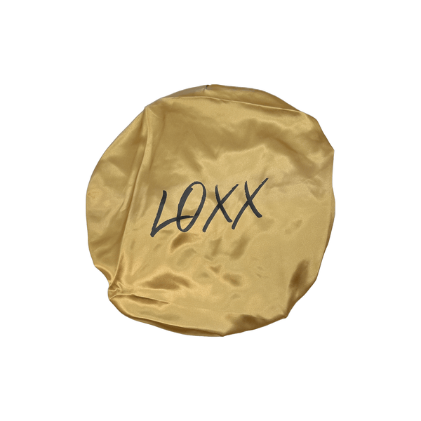 Gold satin bonnet with tie band, non-slip design for 100% human hair protection and overnight wear.